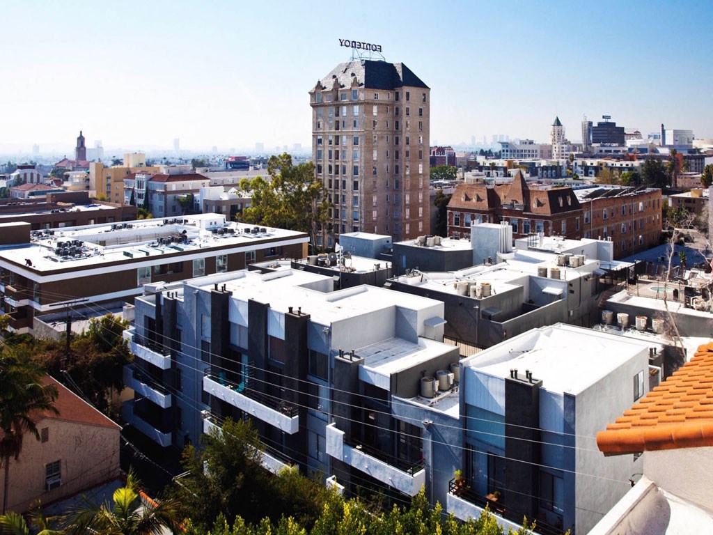 a view of the city from the roof of a building