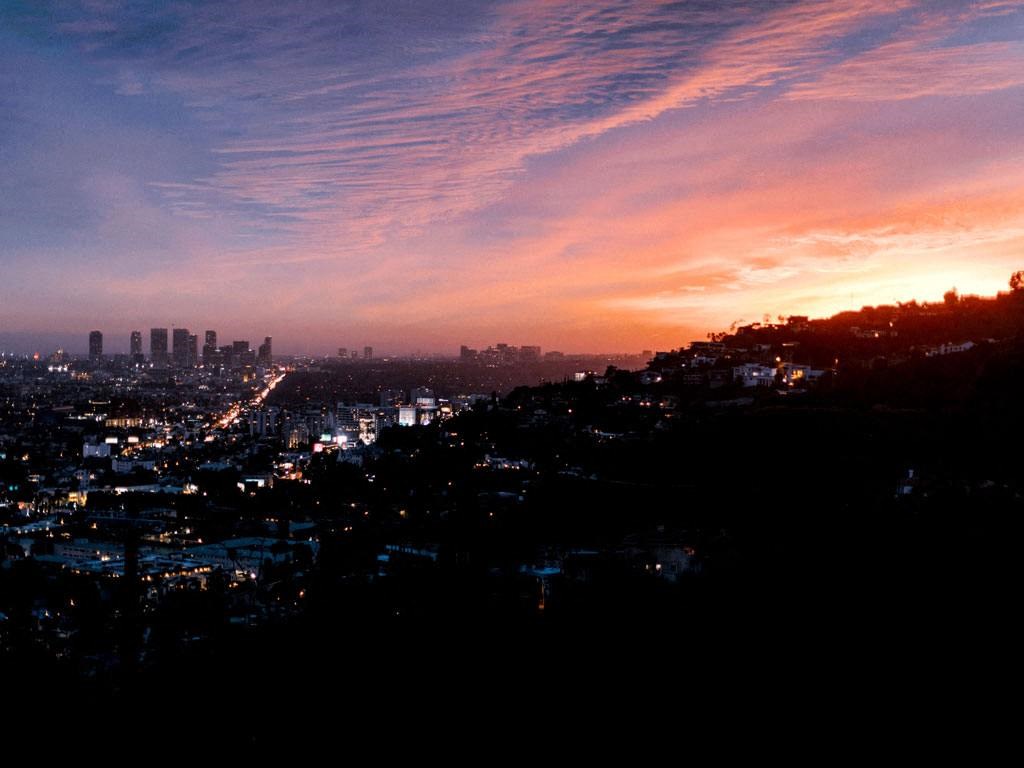 a sunset over the city