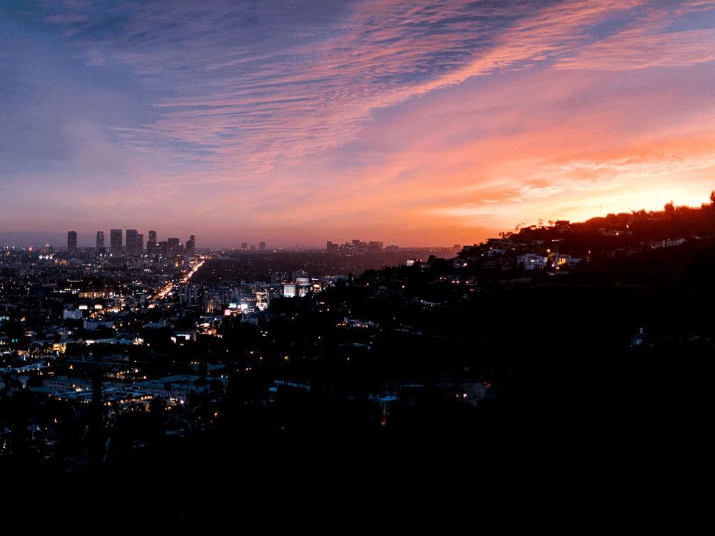 a sunset over the city