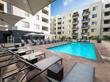 Sparkling Blue Pool and Lounge Chairs  at 1724 Highland Ave, Hollywood, 90028