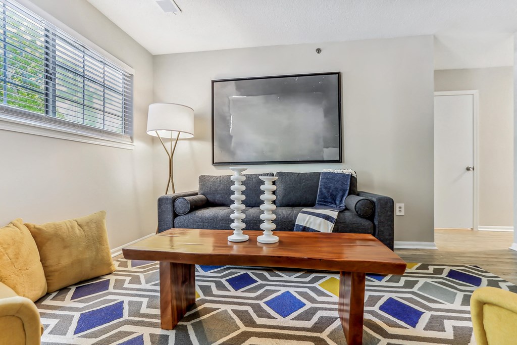 a living room with a couch and a coffee table