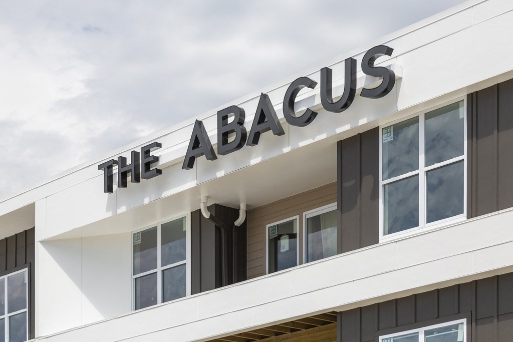 the abacus signage on the side of a building