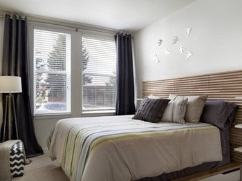 master bedroom with grey comforter - Photo Gallery 6