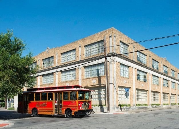 exterior complex with bus route in front