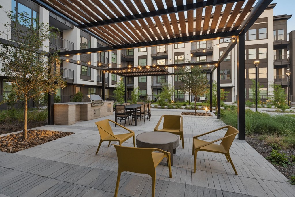 a rendering of an outdoor patio with tables and chairs