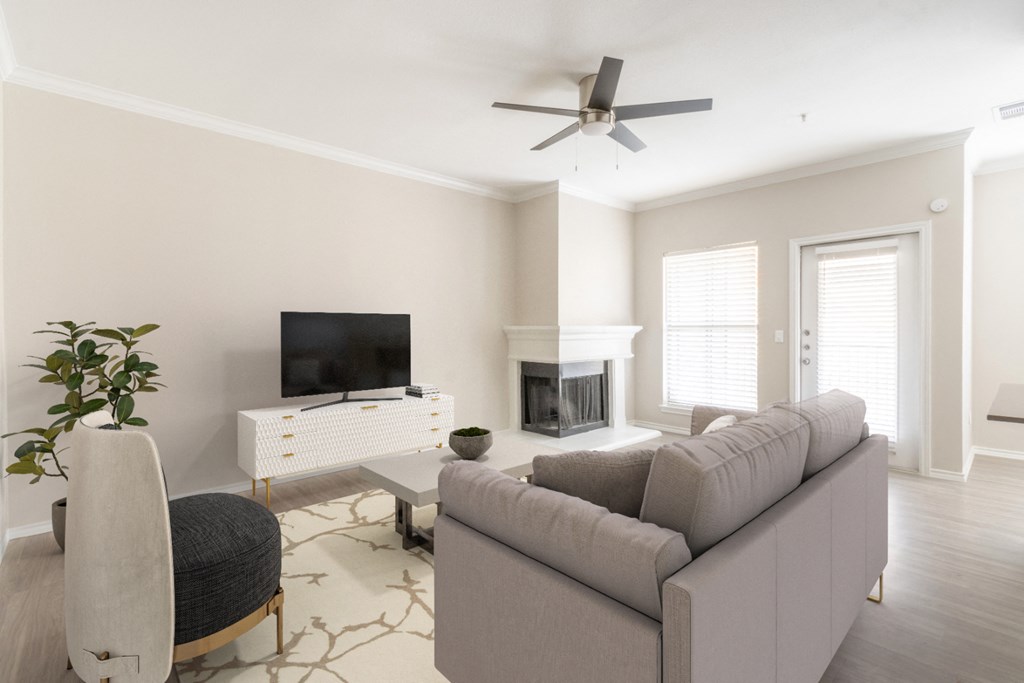 a living room with a couch and a tv