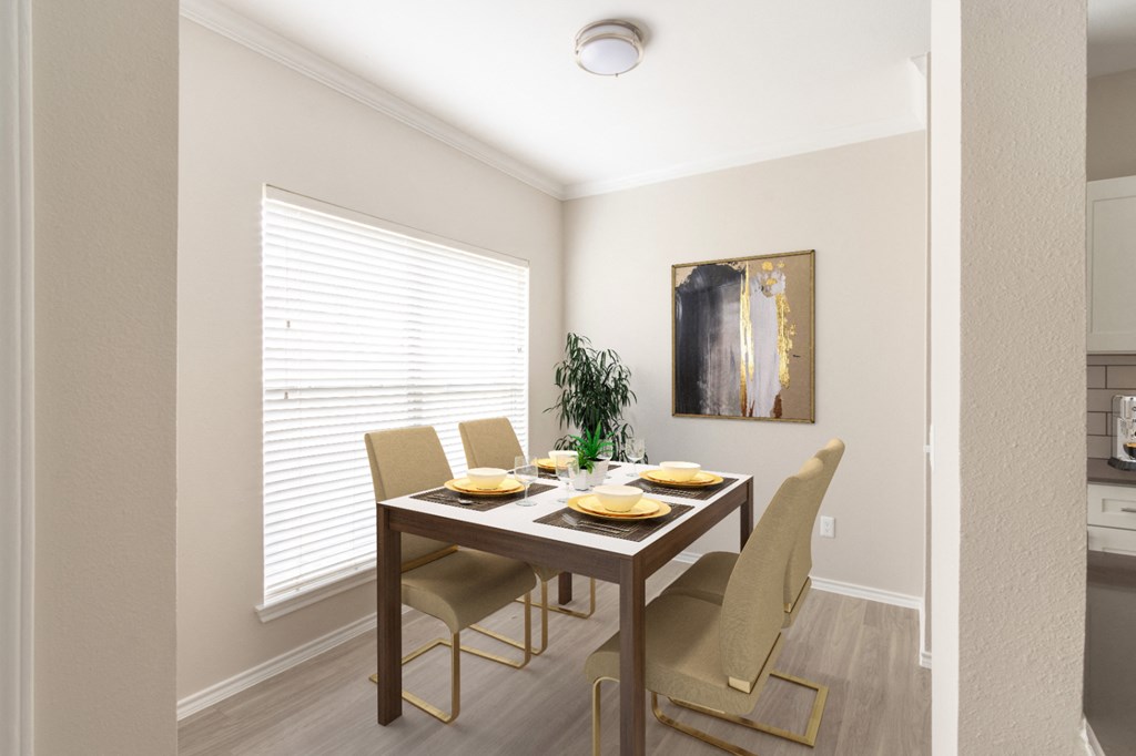 this is a photo of the dining room in a 2 bedroom apartment at deer hill apartments in