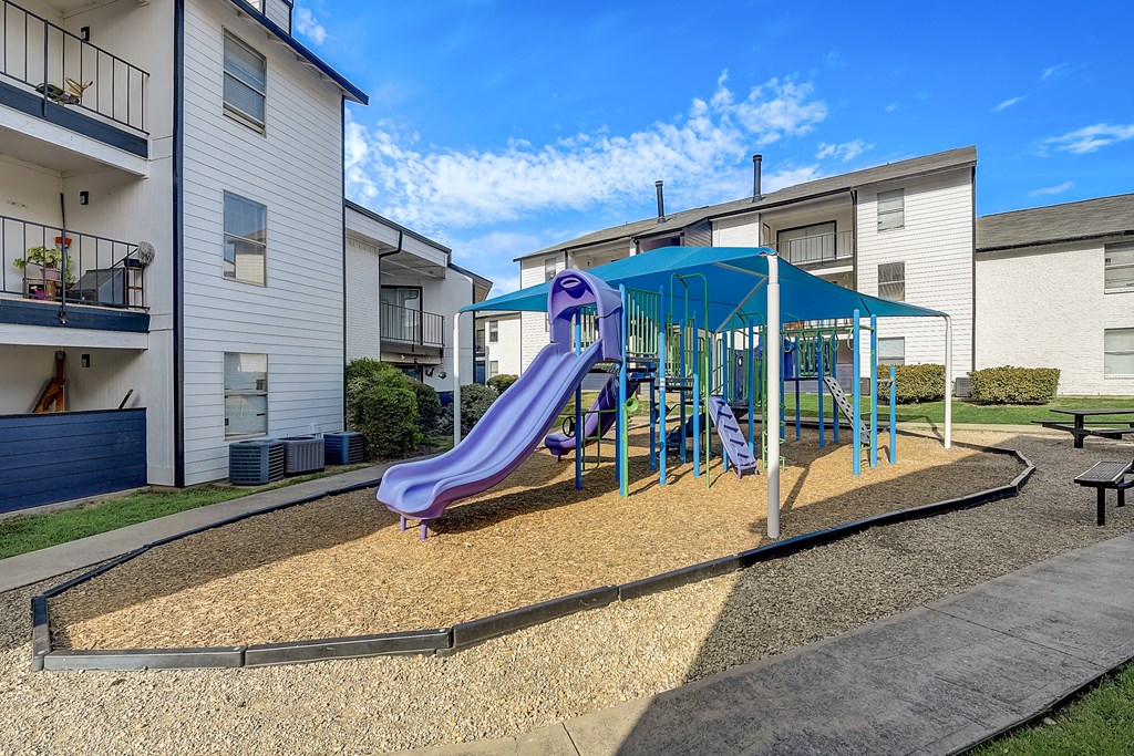 playground at the enclave at woodbridge apartments in sugar land, tx