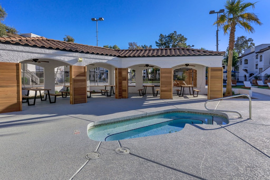 a pool and hot tub at the resort at longboat key club