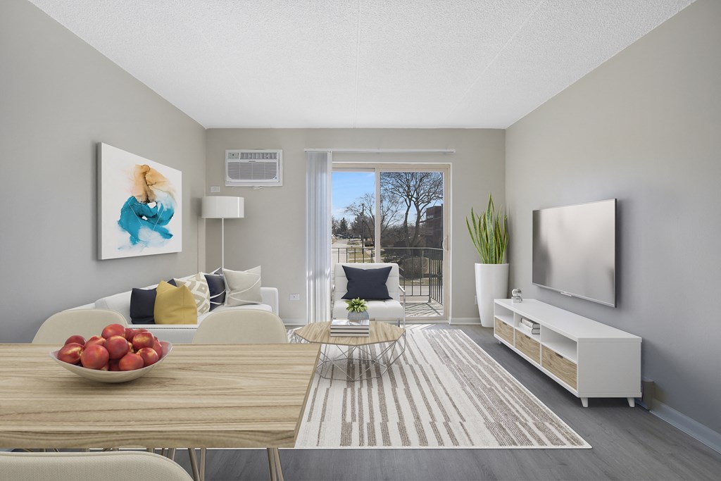 a living room with a table and a couch and a television