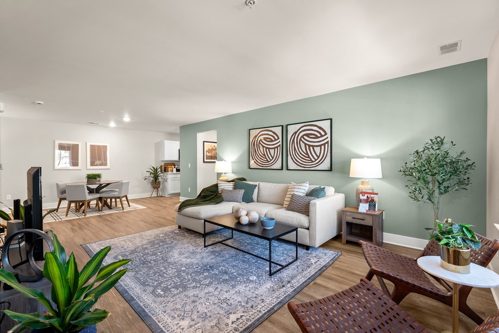 a living room with a couch and a table