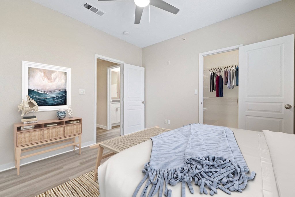 a bedroom with a bed and a closet