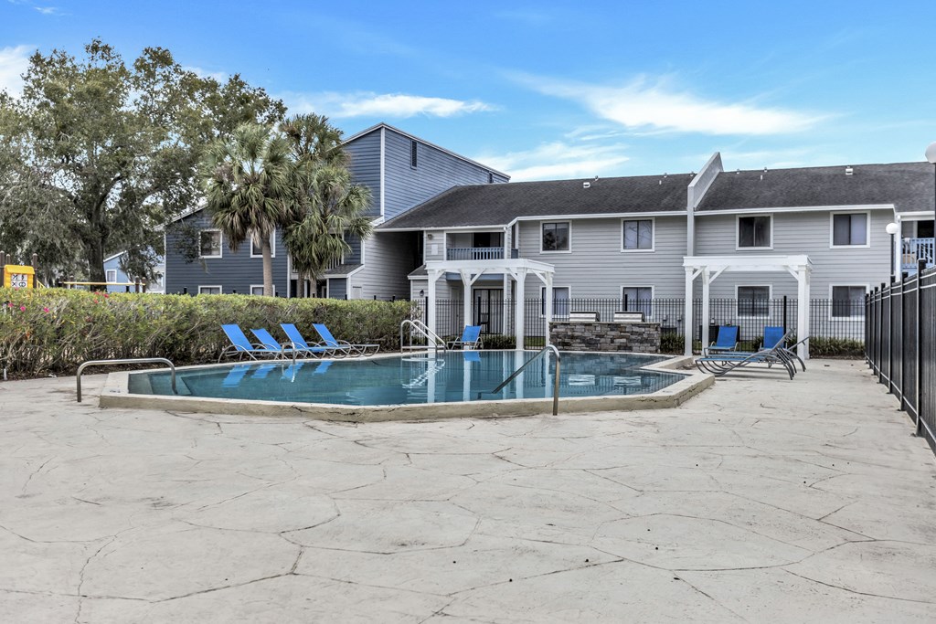 our resort style swimming pool is in front of our house and next to our yard