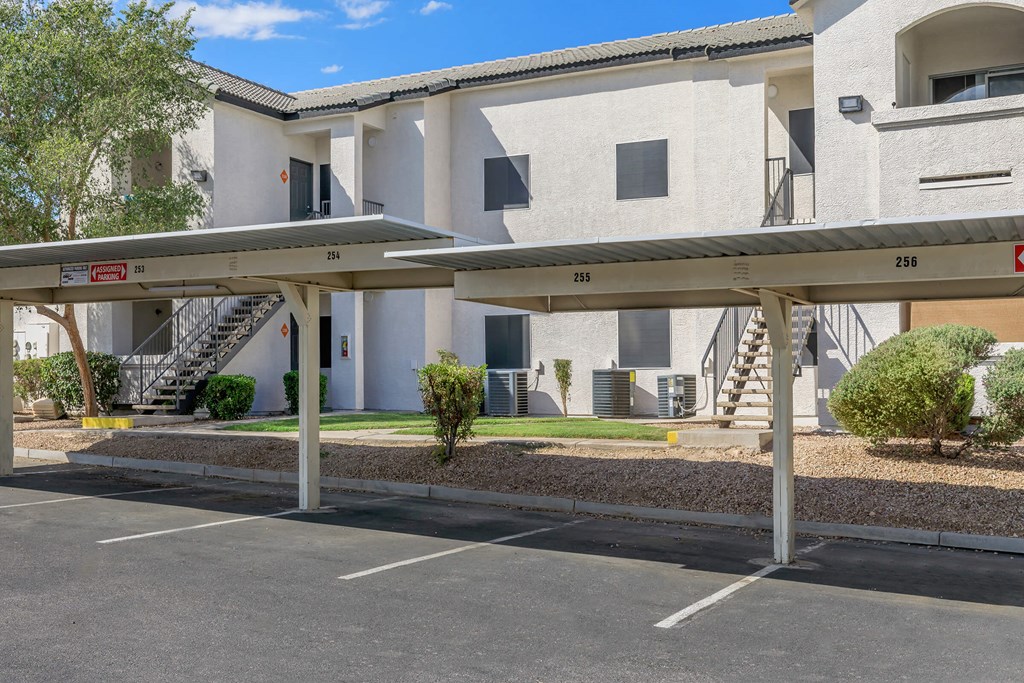 a parking lot at the whispering winds apartments in pearland, tx