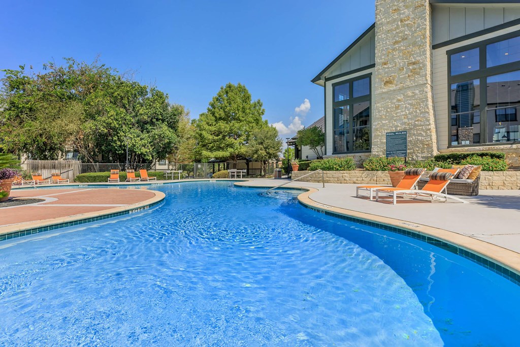 the swimming pool at the falls at rolland park apartments