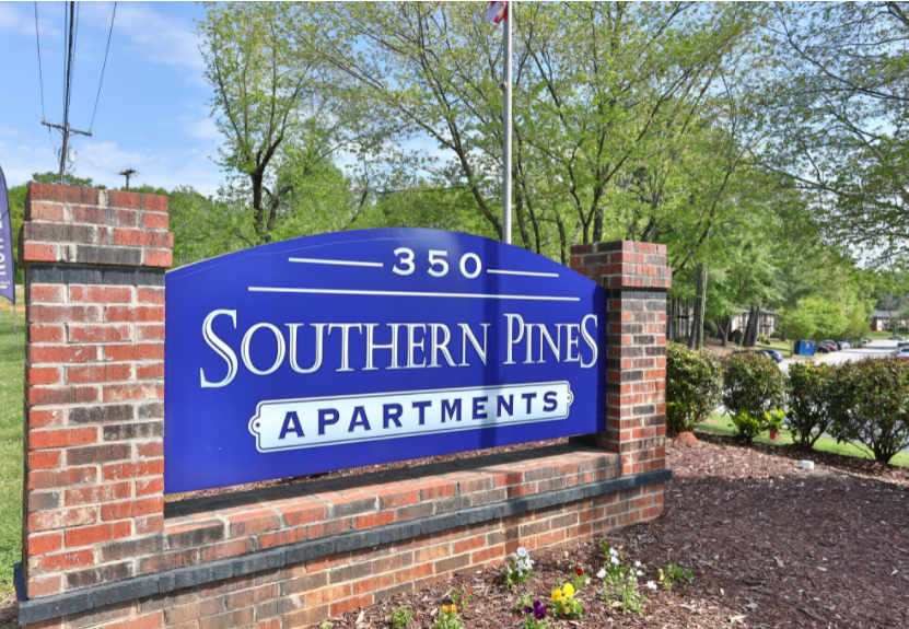 a sign that says southern pines apartments