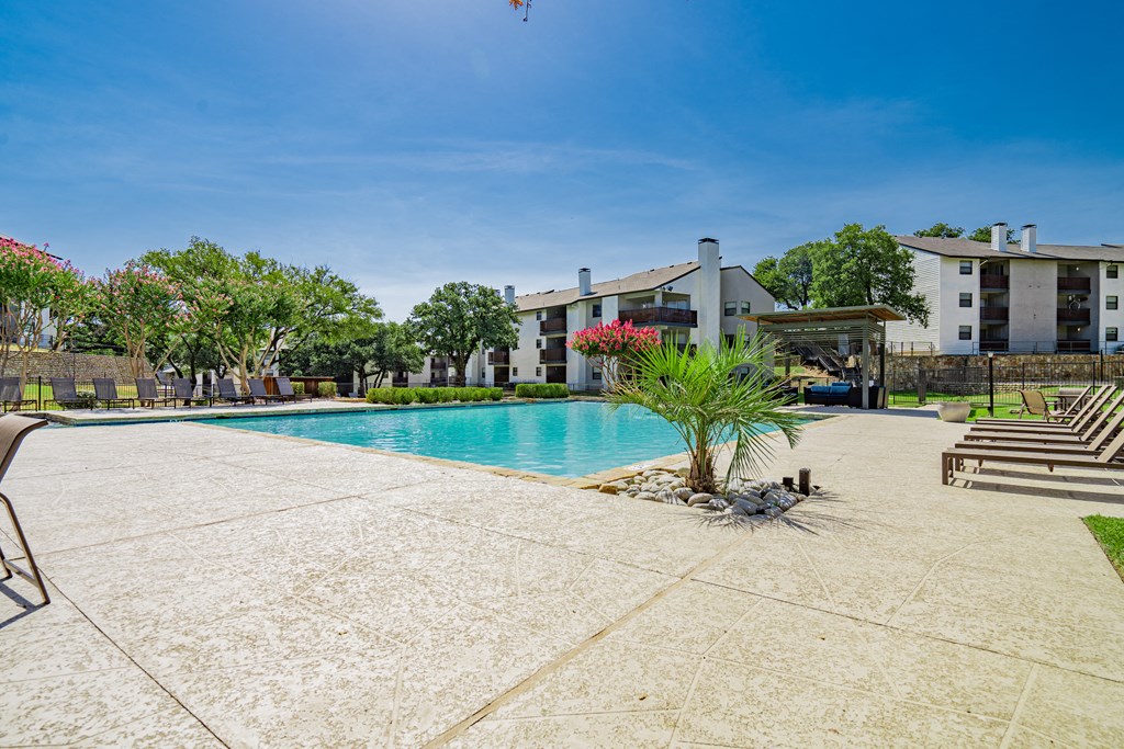 the preserve at ballantyne commons pool with apartment buildings