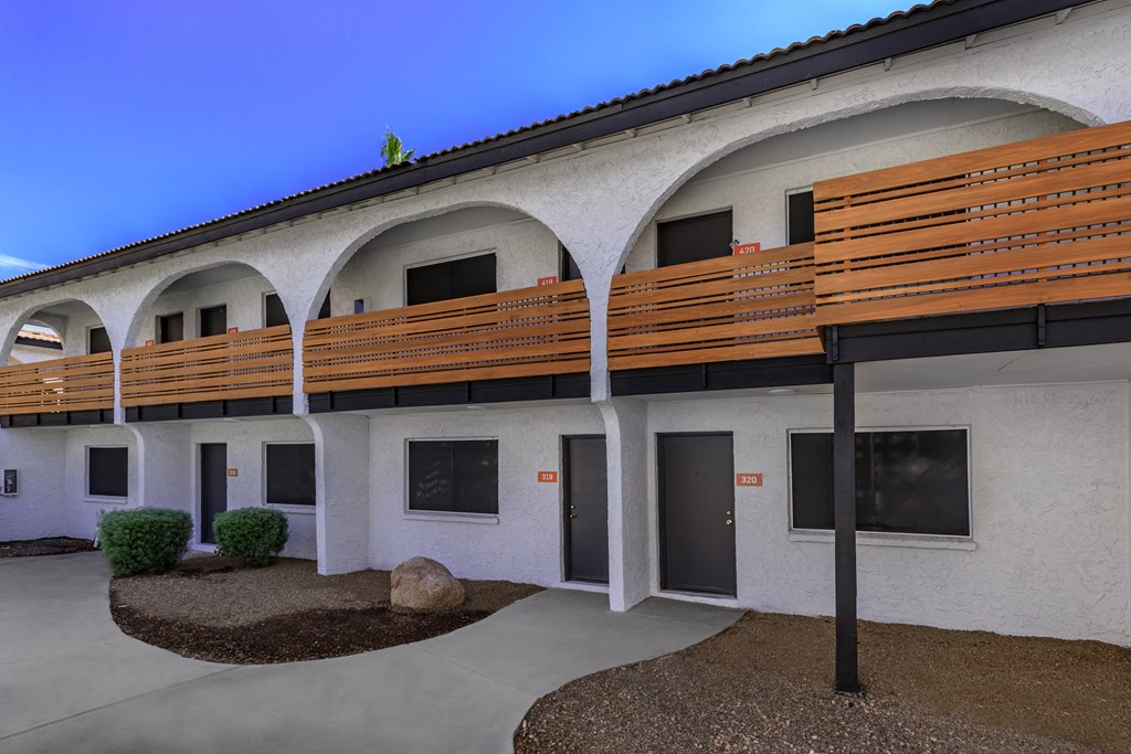 a building with a long wooden balcony