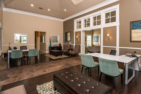 a dining room with a table and chairs and a living room