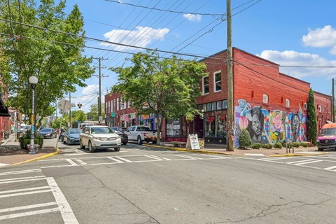 A street view with a red building