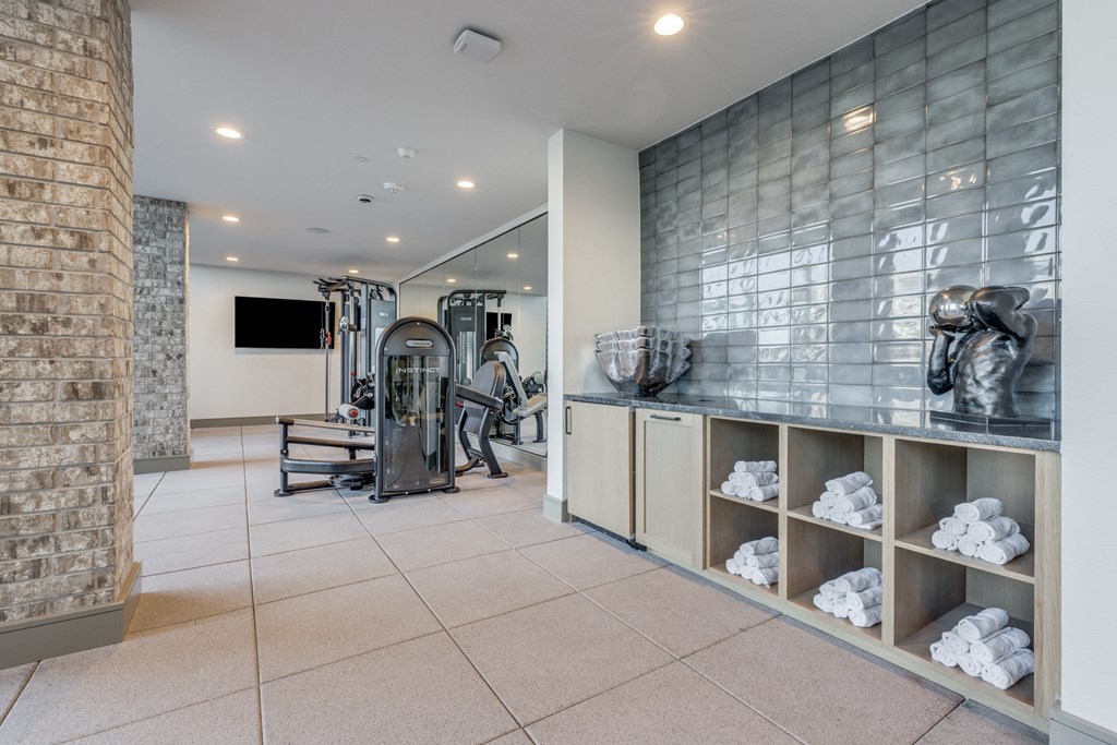 a gym with weights and equipment in a house