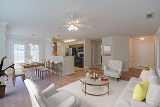 a view of the living room and kitchen from the dining room - Photo Gallery 1