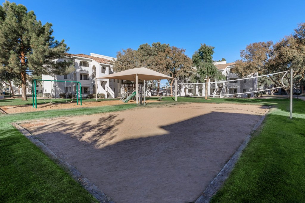 a playground at the whispering winds apartments in pearland, tx