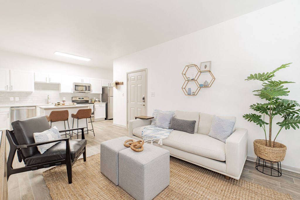 a living room with a couch and a chair