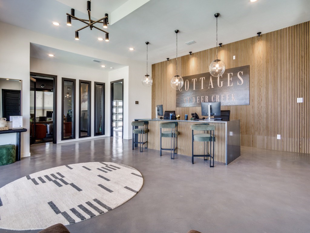 A large room with a sign that says