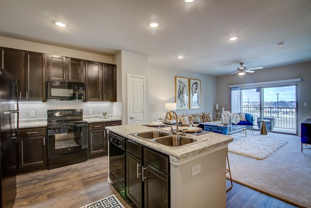 the enclave at homecoming terra vista kitchen and living room