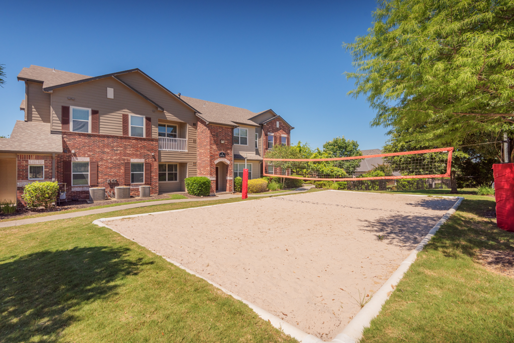 Volleyball court  at Parmer Place Apartments in Austin