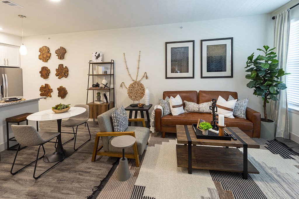 a living room with a couch and a table