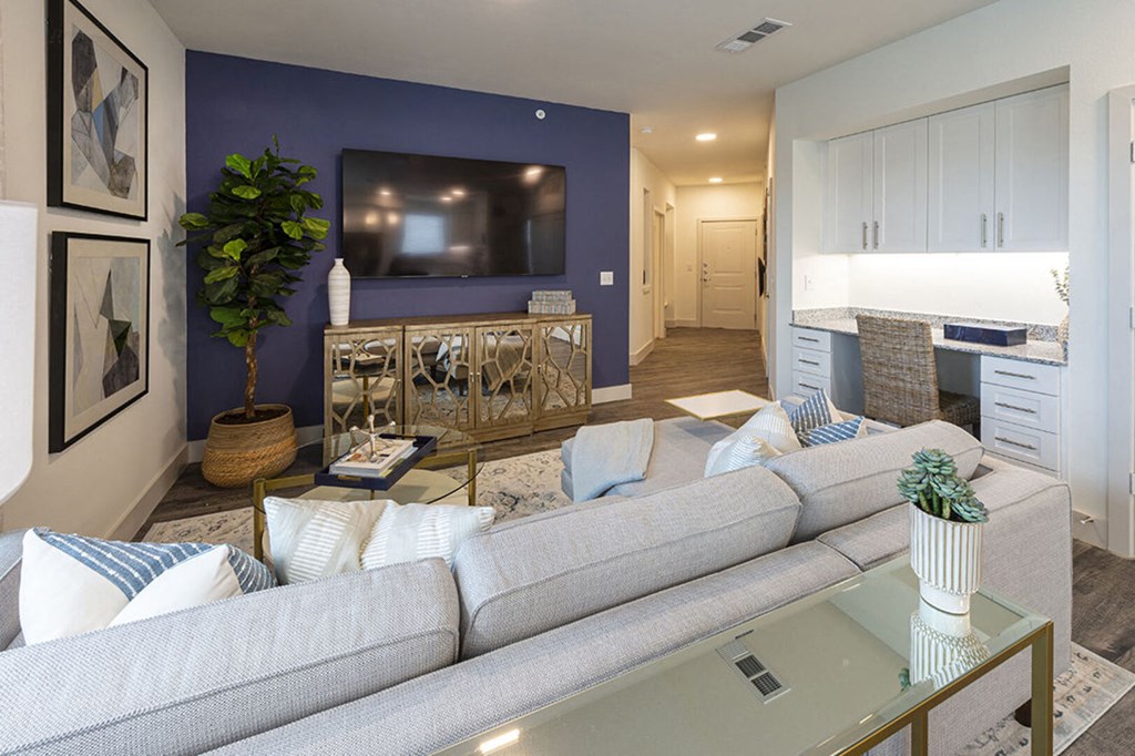a living room with a couch and a television