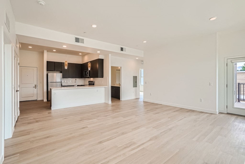 a kitchen and living room in a 555 waverly unit