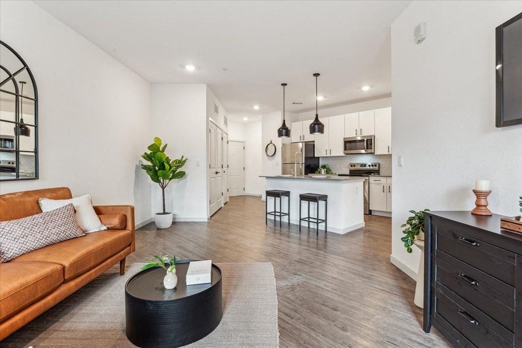 a living room with a couch and a table
