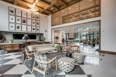 A living room with a black and white checkered floor.