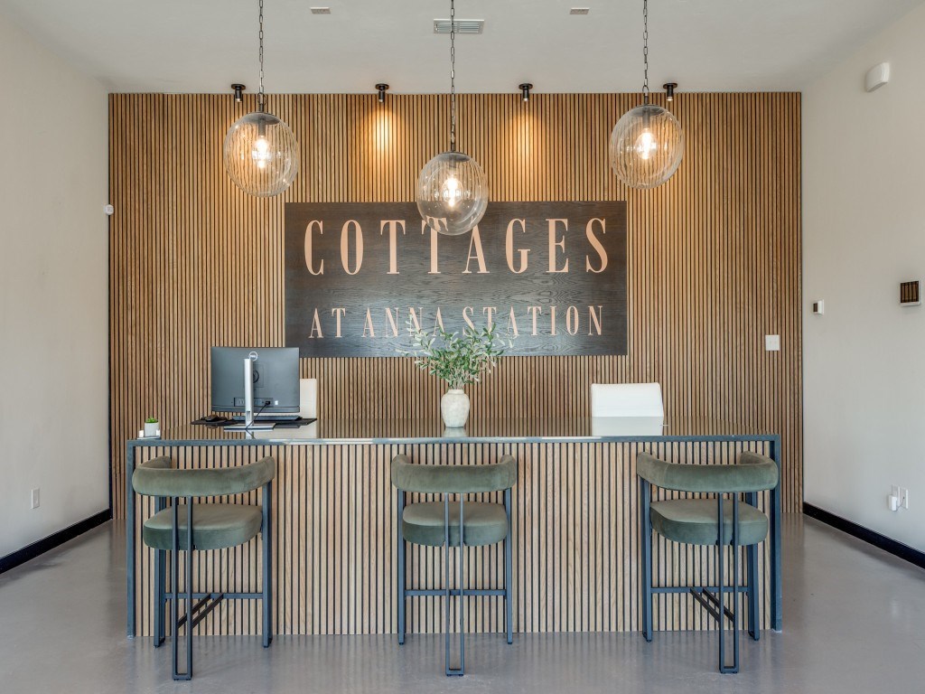 A reception area with a sign that says