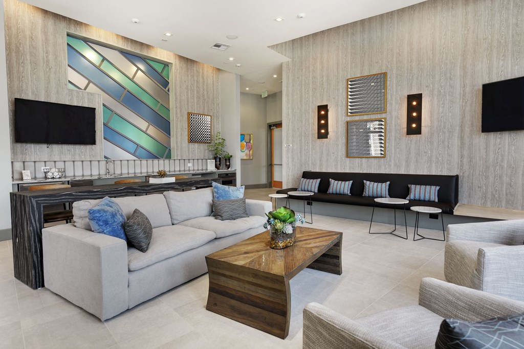 a living room with couches and a coffee table