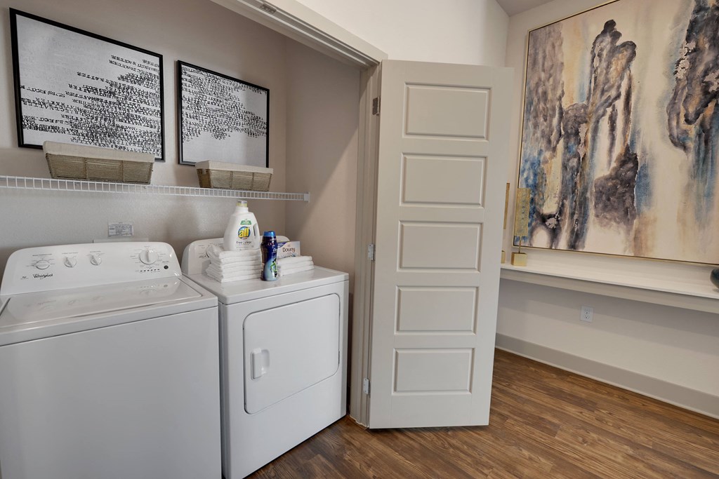 A laundry room with a washer and dryer.