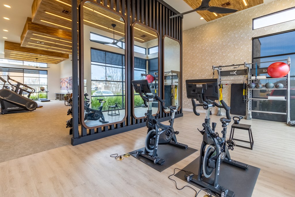 a room filled with lots of exercise equipment