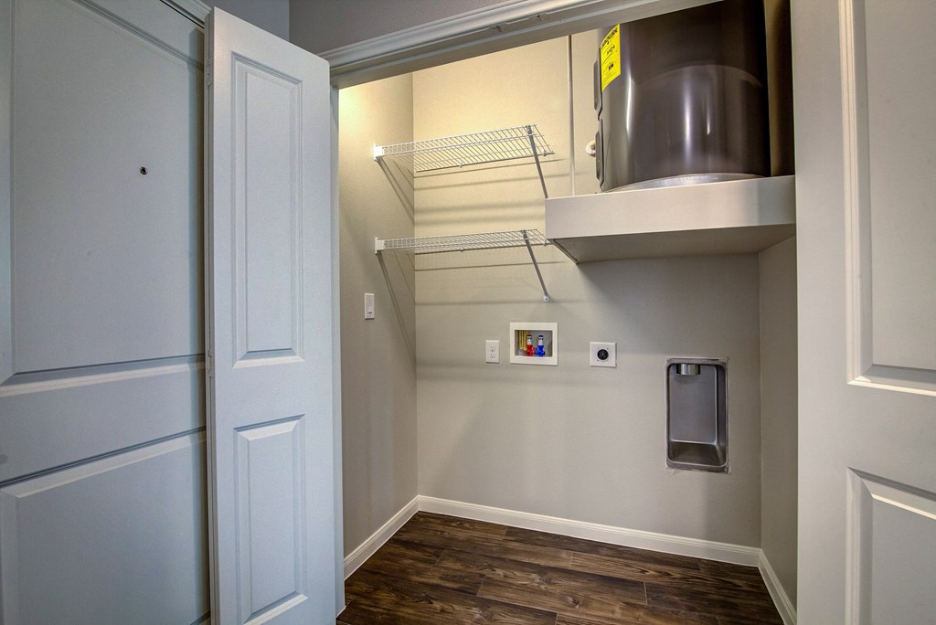a small laundry room with a washer and dryer