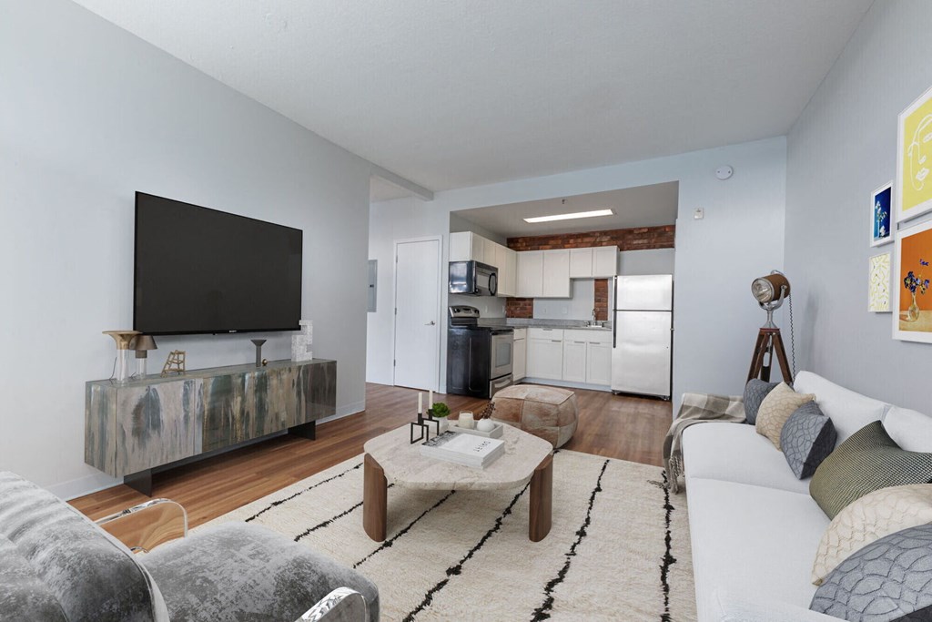 a living room with a couch and a tv