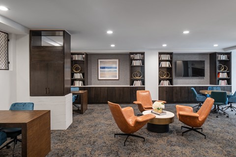 a living room filled with furniture and a television