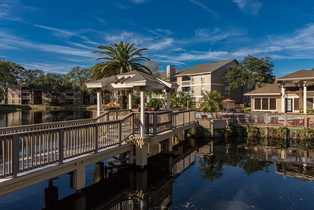 a dock with a gazebo on the water