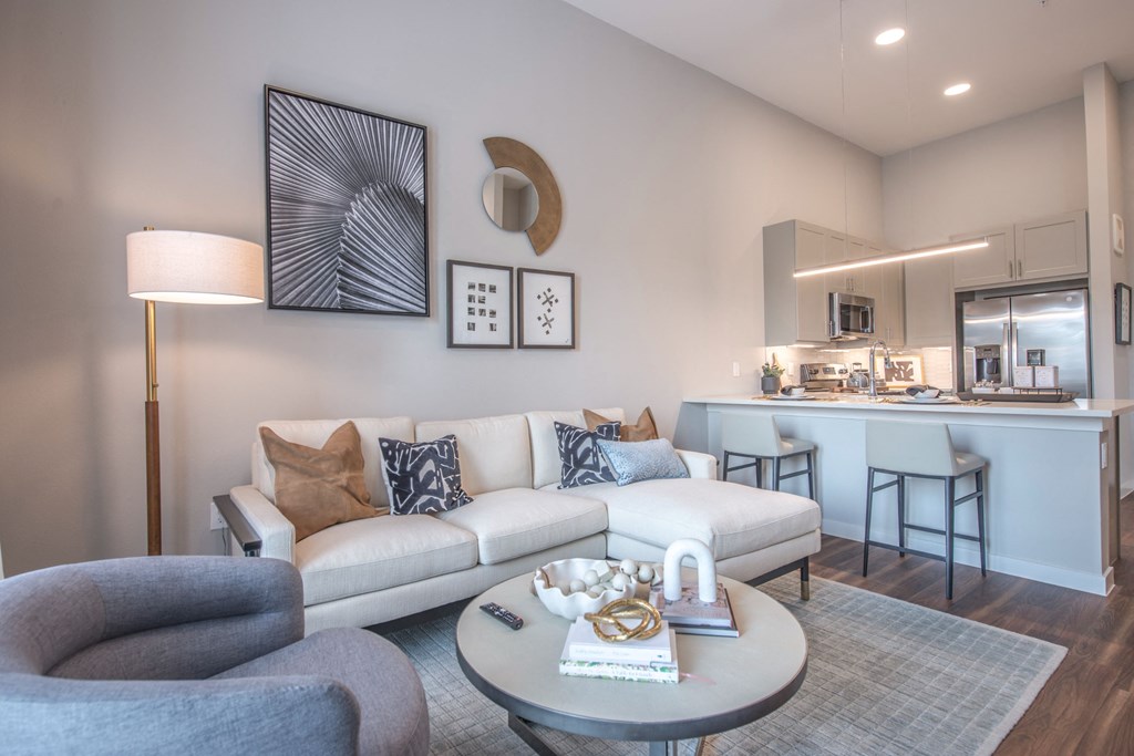 a living room with a couch and a table