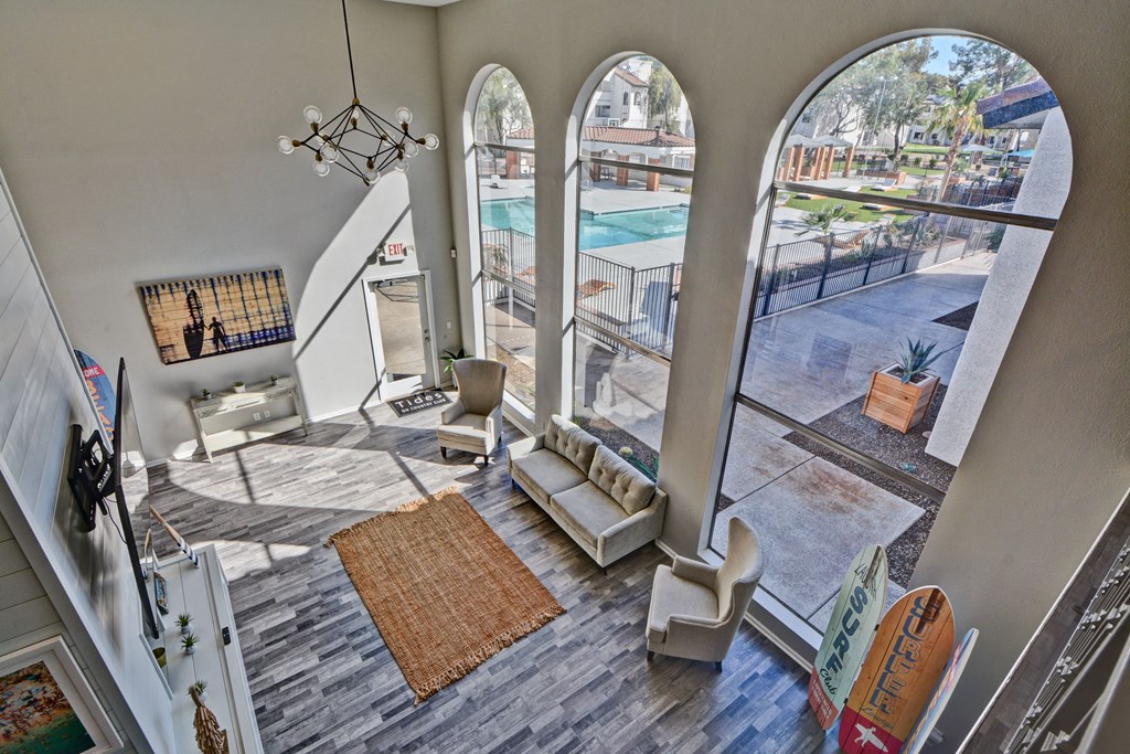 a view of the pool from the upstairs living room