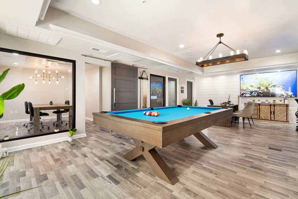 the pool table in the clubhouse at the preserve at great pond apartments in windsor