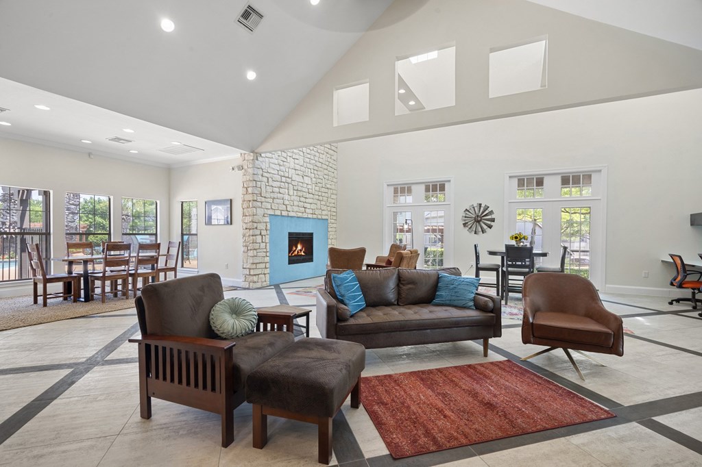 A living room with a fireplace and a couch.