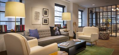 couch and 2 chairs in spacious room
