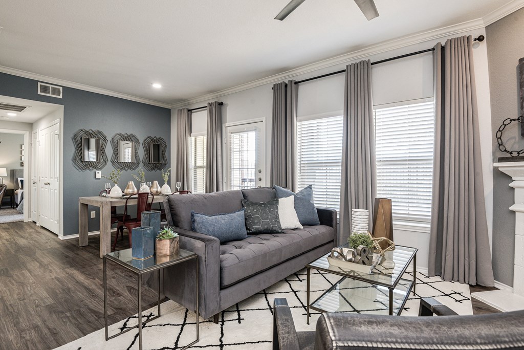 a living room with a couch and a table